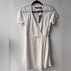 Mid length white wrap dress